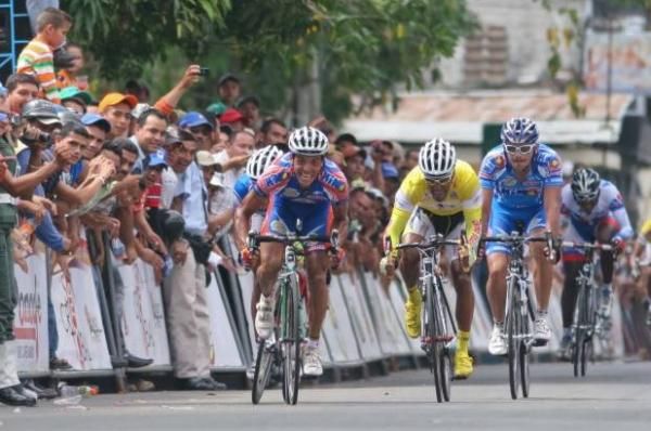 Honorio Machado (Gob Tachira), left, powers to the stage win.