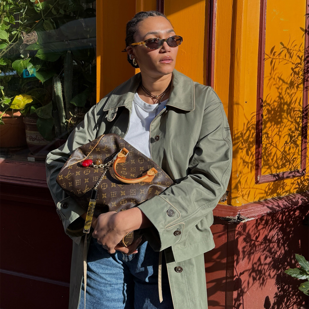 @lenafarl wearing animal-print sneakers