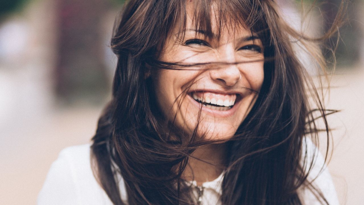 woman with hair blowing in the wind