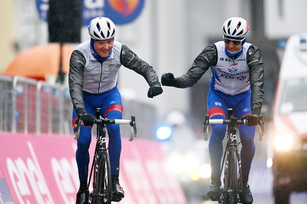 CORTINA DAMPEZZO ITALY MAY 24 Lars Van Den Berg of Netherlands and Team Groupama FDJ Simon Guglielmi of France and Team Groupama FDJ during the 104th Giro dItalia 2021 Stage 16 a 153km stage shortened due to bad weather conditions from Sacile to Cortina dAmpezzo 1210m girodiitalia Giro on May 24 2021 in Cortina dAmpezzo Italy Photo by Stuart FranklinGetty Images