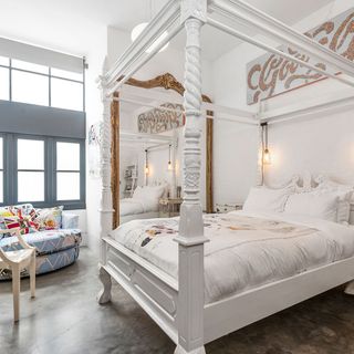 Tall ceilings make this the ideal environment for an epic four-poster bed