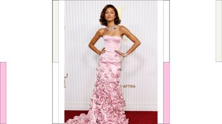 Zendaya wear s pink silk dress with rose detailing as she attends the 29th Annual Screen Actors Guild Awards at Fairmont Century Plaza on February 26, 2023 in Los Angeles, California.