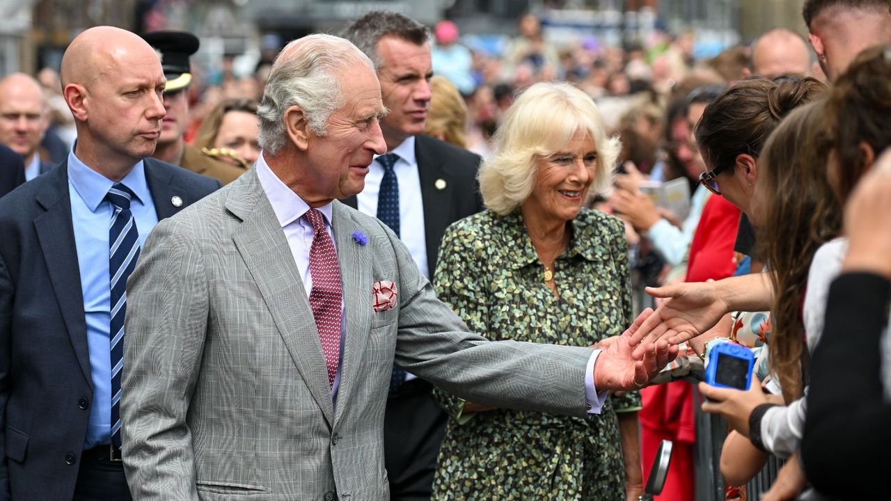 Queen Camilla&#039;s gold pyramid drop earrings