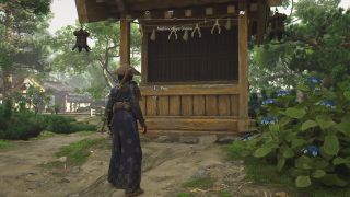 Assassin's Creed Shadows knowledge rank - Naoe is about to pray at a large shrine.