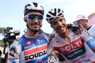 FANO ITALY MAY 16 LR Stage winner Julian Alaphilippe of France and Team Soudal QuickStep celebrates the victory with Mirco Maestri of Italy and Team Polti Kometa after the 107th Giro dItalia 2024 Stage 12 a 193km stage from Martinsicuro to Fano UCIWT on May 16 2024 in Fano Italy Photo by Marco Alpozzi PoolGetty Images