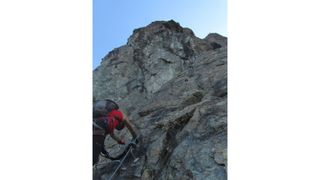 Climber on a via ferrata