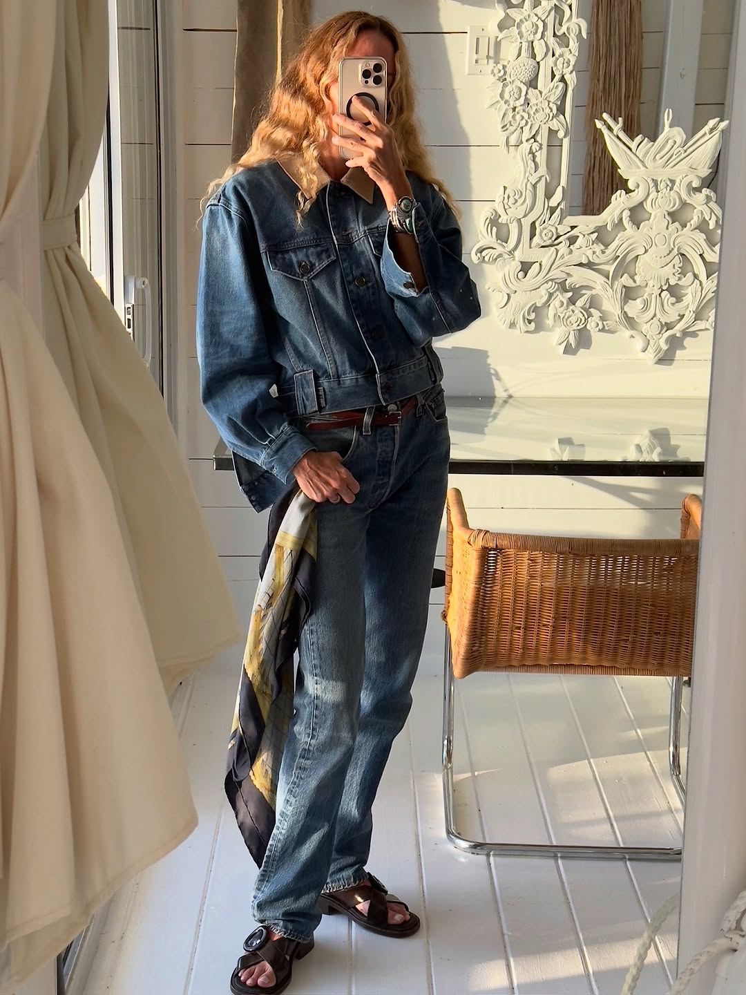 Woman wearing denim on denim outfit fall 2025.