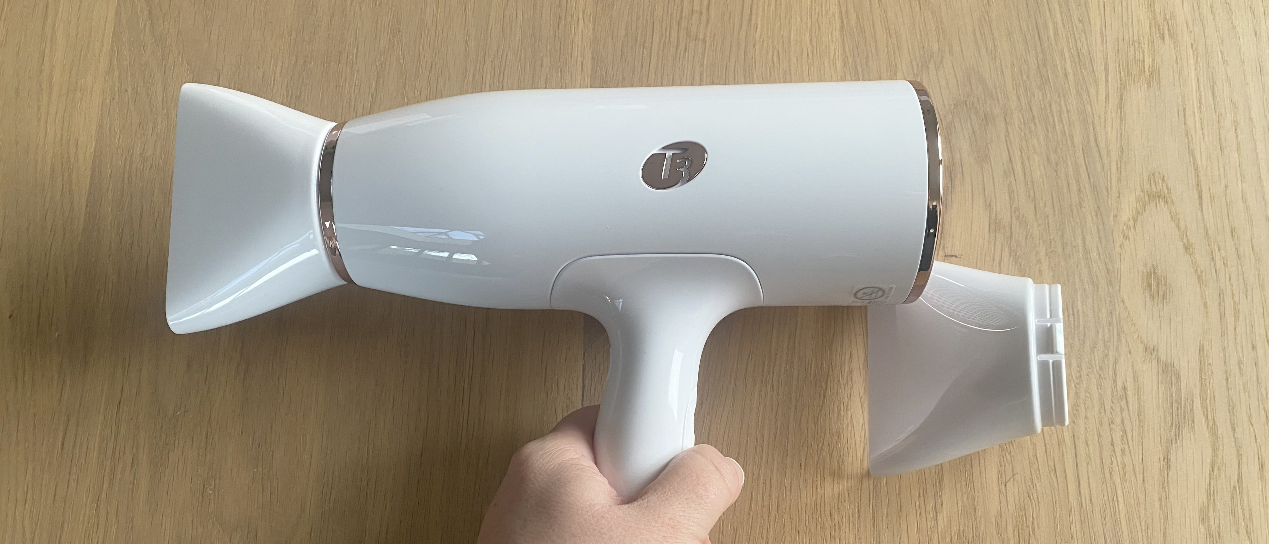 T3 AireLuxe hair dryer in reviewer&#039;s hand