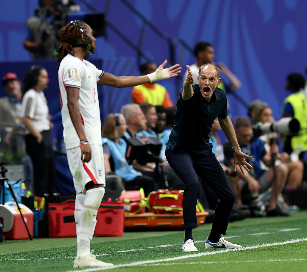 ATLANTA, GEORGIA - JULY 01: Thomas Tuchel, Manager of England, reacts with Djed Spence #25 of England during the FIFA World Cup 2026 Round Of 32 match between England and Congo DR at Atlanta Stadium on July 01, 2026 in Atlanta, Georgia. (Photo by Eddie Keogh - The FA/The FA via Getty Images)