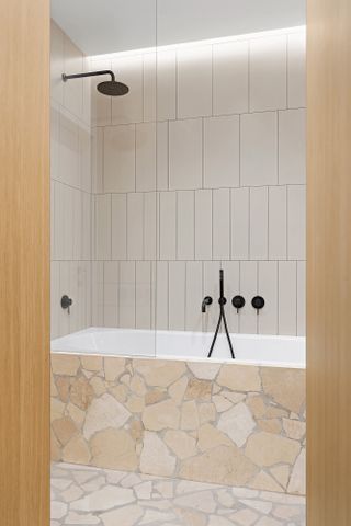 a bathroom clad in flagstone paving