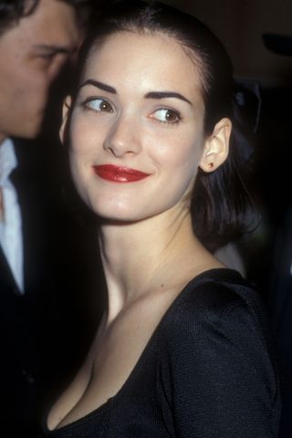 Winona Ryder wearing a red lip