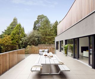 Large outdoor space of contemporary home with seating