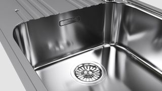 A gleaming stainless steel sink 