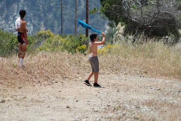 Two young Andy Schleck fans cheer on their hero on Glendora Mountain Road.
