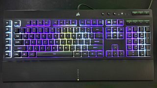 Corsair K55 RGB Pro XT gaming keyboard with spiral lighting pattern