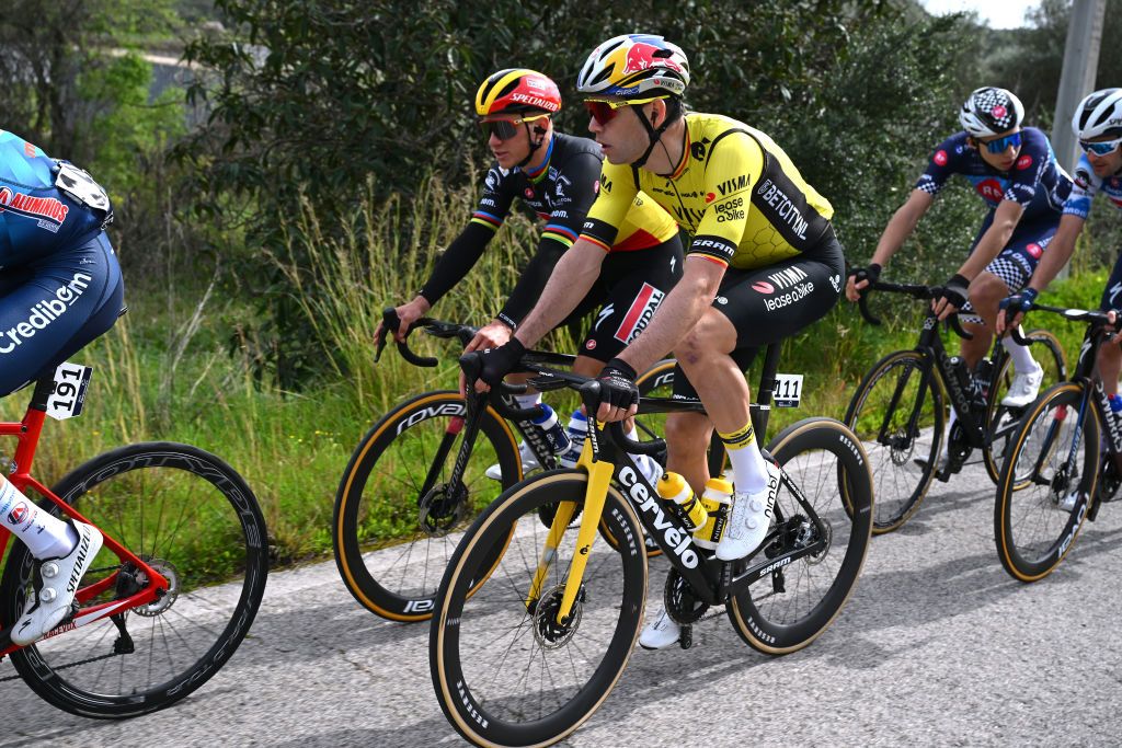 TAVIRA PORTUGAL FEBRUARY 16 LR Remco Evenepoel of Belgium and Team Soudal Quick Step and Wout Van Aert of Belgium and Team Visma Lease a Bike compete during the 50th Volta ao Algarve em Bicicleta 2024 Stage 3 a 1922km stage from Vila Real de Santo Antonio to Tavira on February 16 2024 in Tavira Portugal Photo by Dario BelingheriGetty Images