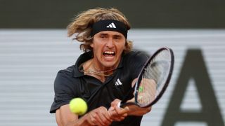 Alexander Zverev of Germany plays a backhand against Alex Molcan of Slovakia during the Men's Singles Second Round match on Day Five of the 2023 French Open at Roland Garros on June 01, 2023