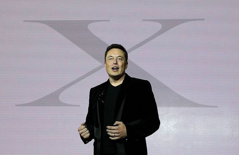 Elon Musk speaks during an event to launch the new Tesla Model X Crossover SUV in Fremont, California, on Sept. 29, 2015.