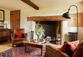cotswold house renovation cosy living room fireplace