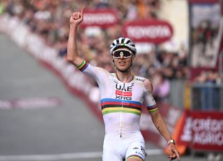 SIENA ITALY MARCH 08 Tadej Pogacar of Slovenia and UAE Team EmiratesXRG celebrates at finish line as race winner during the 19th Strade Bianche 2025 Mens Elite a 213km one day race from Siena to Siena 320m UCIWT on March 08 2025 in Siena Italy Photo by Tim de WaeleGetty Images