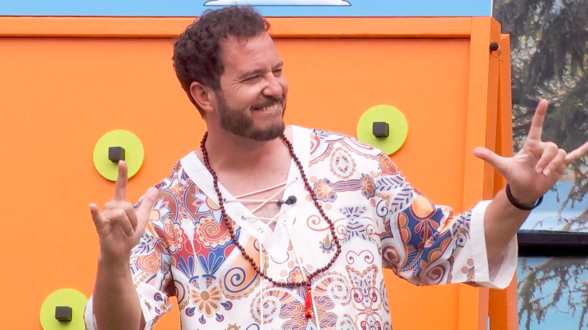 Rick chucking up the love signs on Big Brother