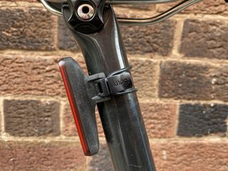 Image shows the Knog Blinder rear light mounted to a bike.