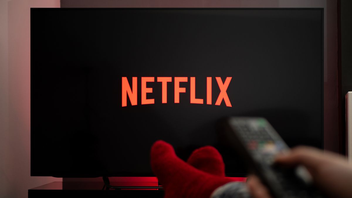 Man watching Netflix on the TV