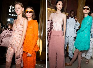 Models wear orange floral overall, bright orange top and trousers, baby pink top and trousers, light blue top and trousers, and bright blue dress