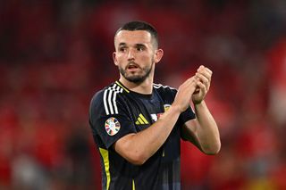 Scotland Euro 2024 squad John McGinn of Scotland applauds the fans after the UEFA EURO 2024 group stage match between Scotland and Switzerland at Cologne Stadium on June 19, 2024 in Cologne, Germany. (Photo by Stu Forster/Getty Images)