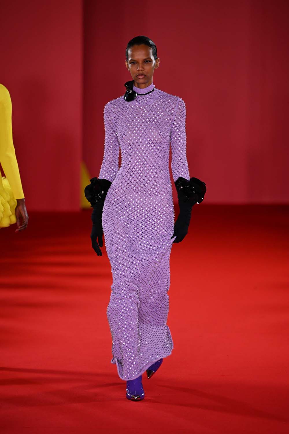 on the runway at London Fashion Week AW23