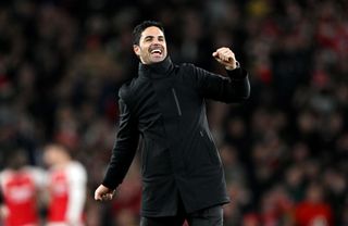 Arsenal manager Mikel Arteta celebrates after the team's victory in the Premier League match between Arsenal FC and Liverpool FC at Emirates Stadium on February 04, 2024 in London, England.