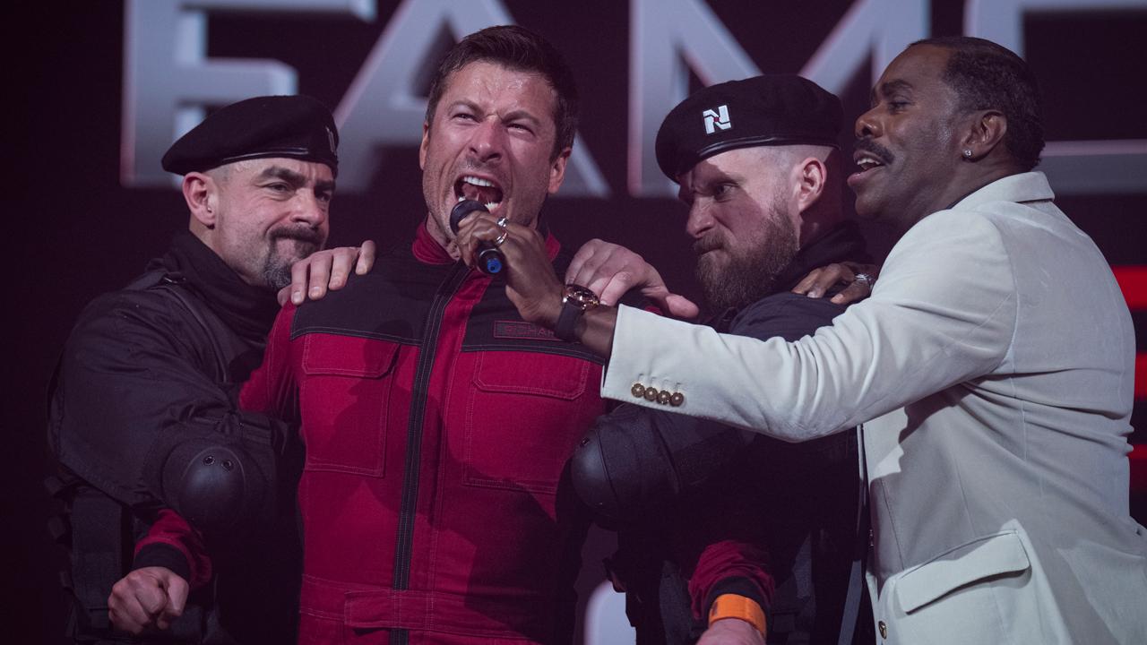 Glen Powell screaming with Colman Domingo in The Running Man