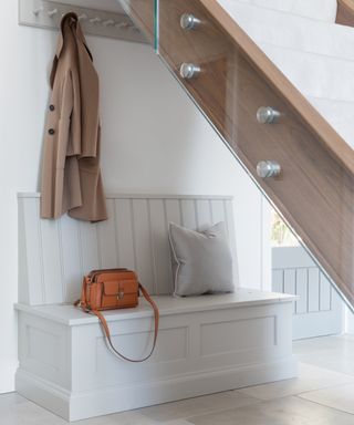 White boot root style space under the stairs