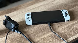 Genki Covert Dock plugged into Nintendo Switch console