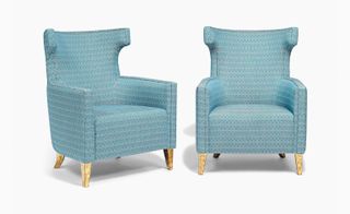 The wingback armchairs have been upholstered in a bespoke fabric