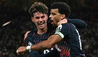 Dominic Solanke celebrates with Tottenham Hotspur's Archie Gray after equalising in the Premier League match against Manchester United at Old Trafford in Manchester, England, on October 10, 2026