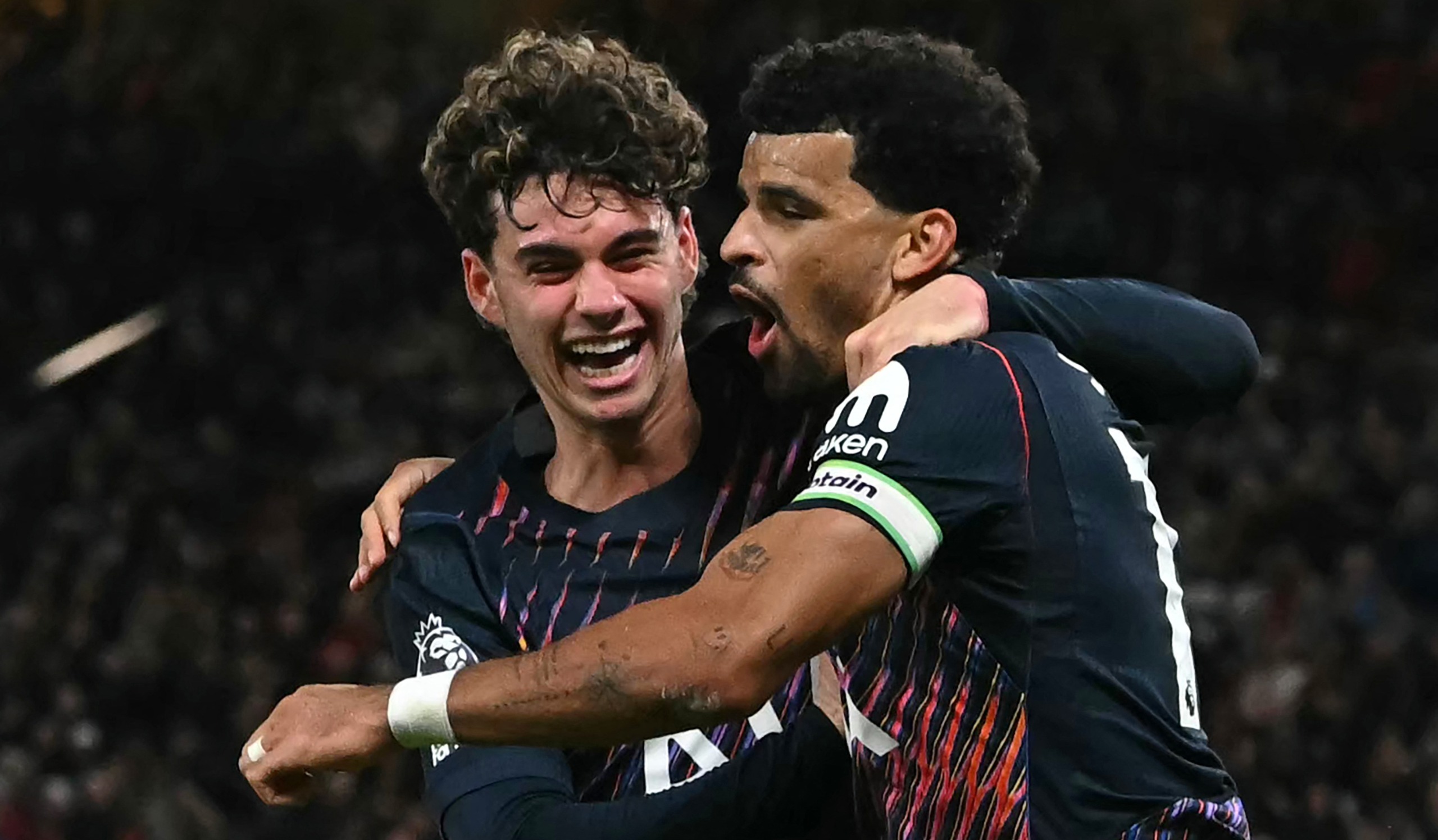 Dominic Solanke celebrates with Tottenham Hotspur's Archie Gray after equalising in the Premier League match against Manchester United at Old Trafford in Manchester, England, on October 10, 2026