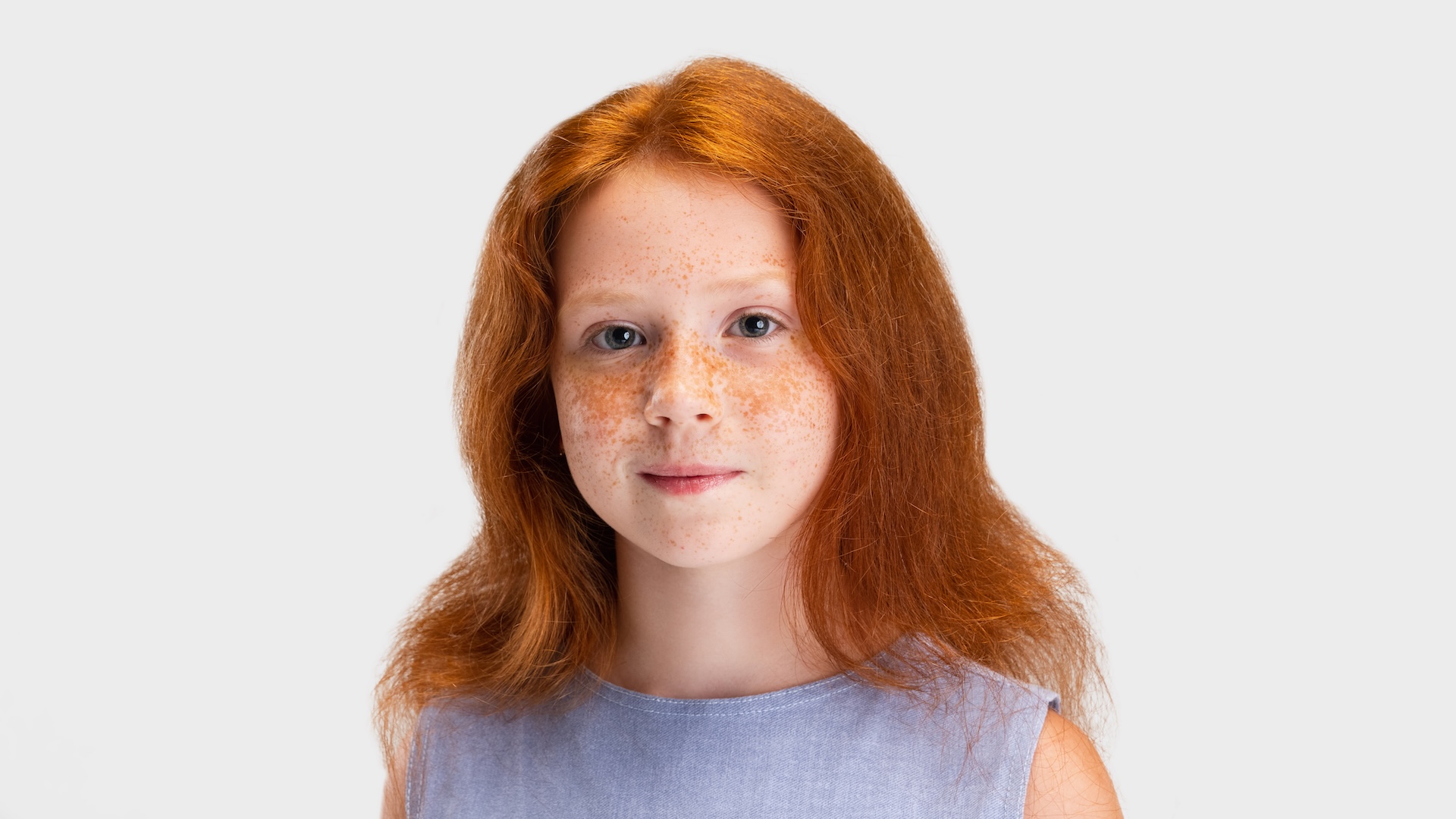 a photo of a redheaded girl with freckles