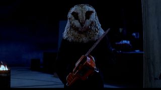 A man in a owl mask wields a chainsaw in 'Stage Fright'