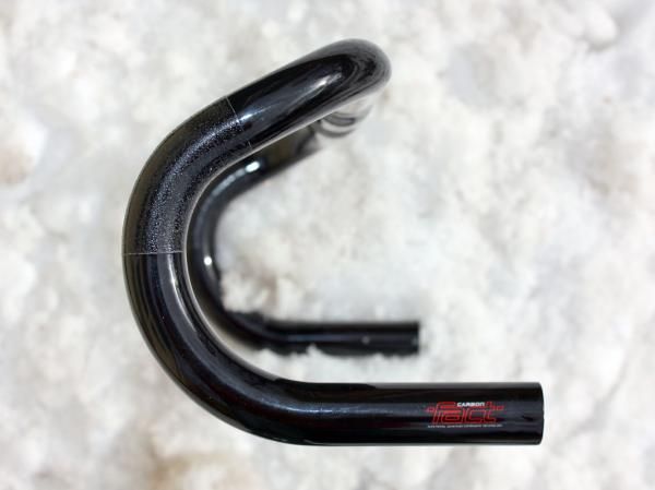 The traditional bend offers more positioning flexibility than anatomic bars, many of which offer little real difference between riding on the hoods and riding in the drops