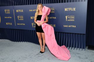 LOS ANGELES, CALIFORNIA - FEBRUARY 24: Margot Robbie attends 30th Annual Screen Actors Guild Awards - Arrivals at Shrine Auditorium and Expo Hall on February 24, 2024 in Los Angeles, California.