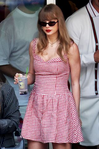 Taylor Swift wore a red and white gingham dress at the 2024 US Open