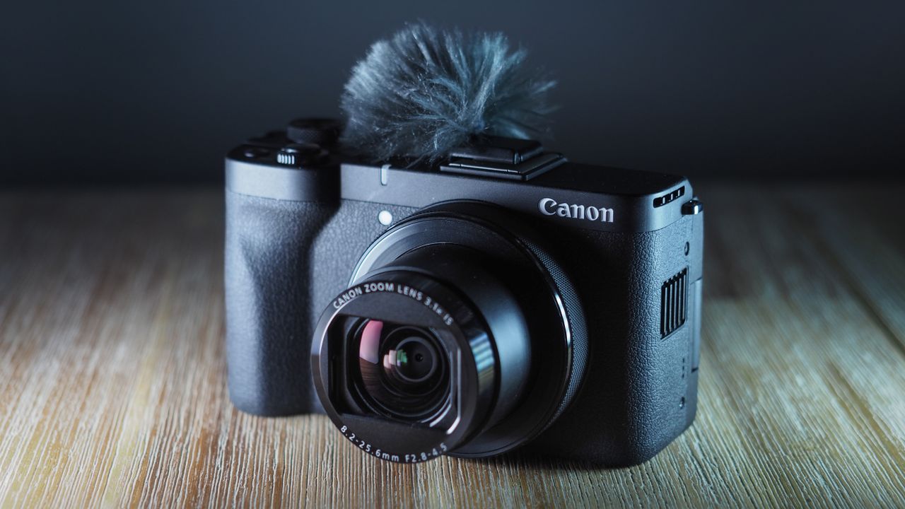 Canon PowerShot V1 on a wooden surface