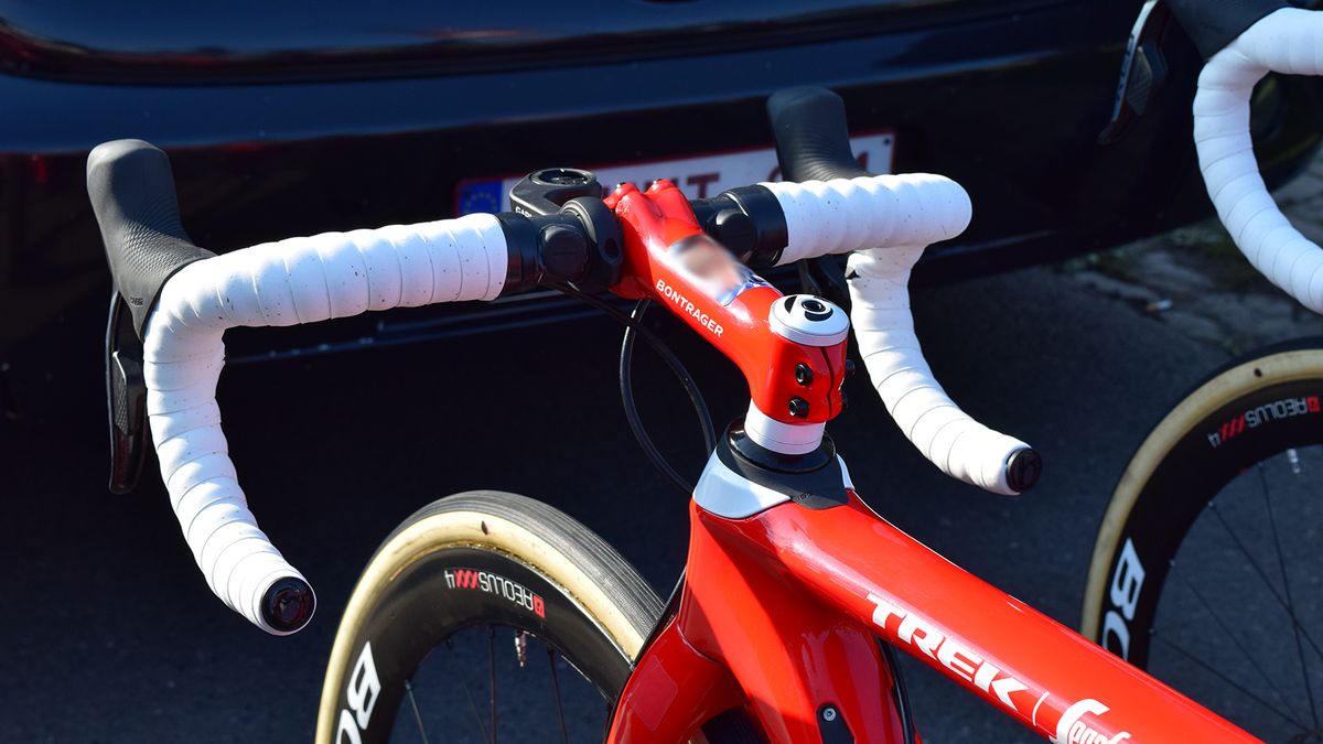 John Degenkolb had Di2 sprint shifters on the drops and SRAM Blips on the handlebar tops, alongside a photo of his family on his stem