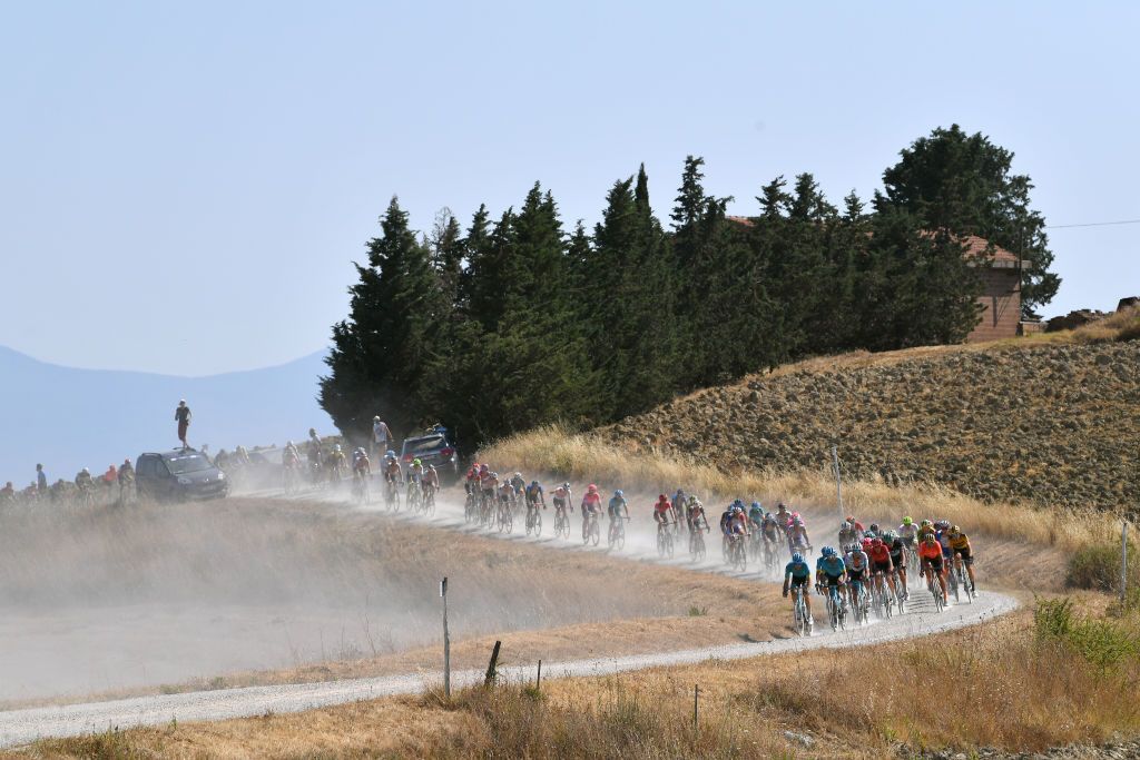 SIENA ITALY AUGUST 01 Peloton Dust Gravel Strokes Landscape during the Eroica 14th Strade Bianche 2020 Men a 184km race from Siena to SienaPiazza del Campo StradeBianche on August 01 2020 in Siena Italy Photo by Tim de WaeleGetty Images