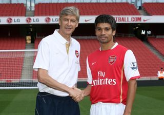 Arsene Wenger the Arsenal manager with new signing Eduardo during the Arsenal 1st team photocall on August 7, 2007 in London, England.