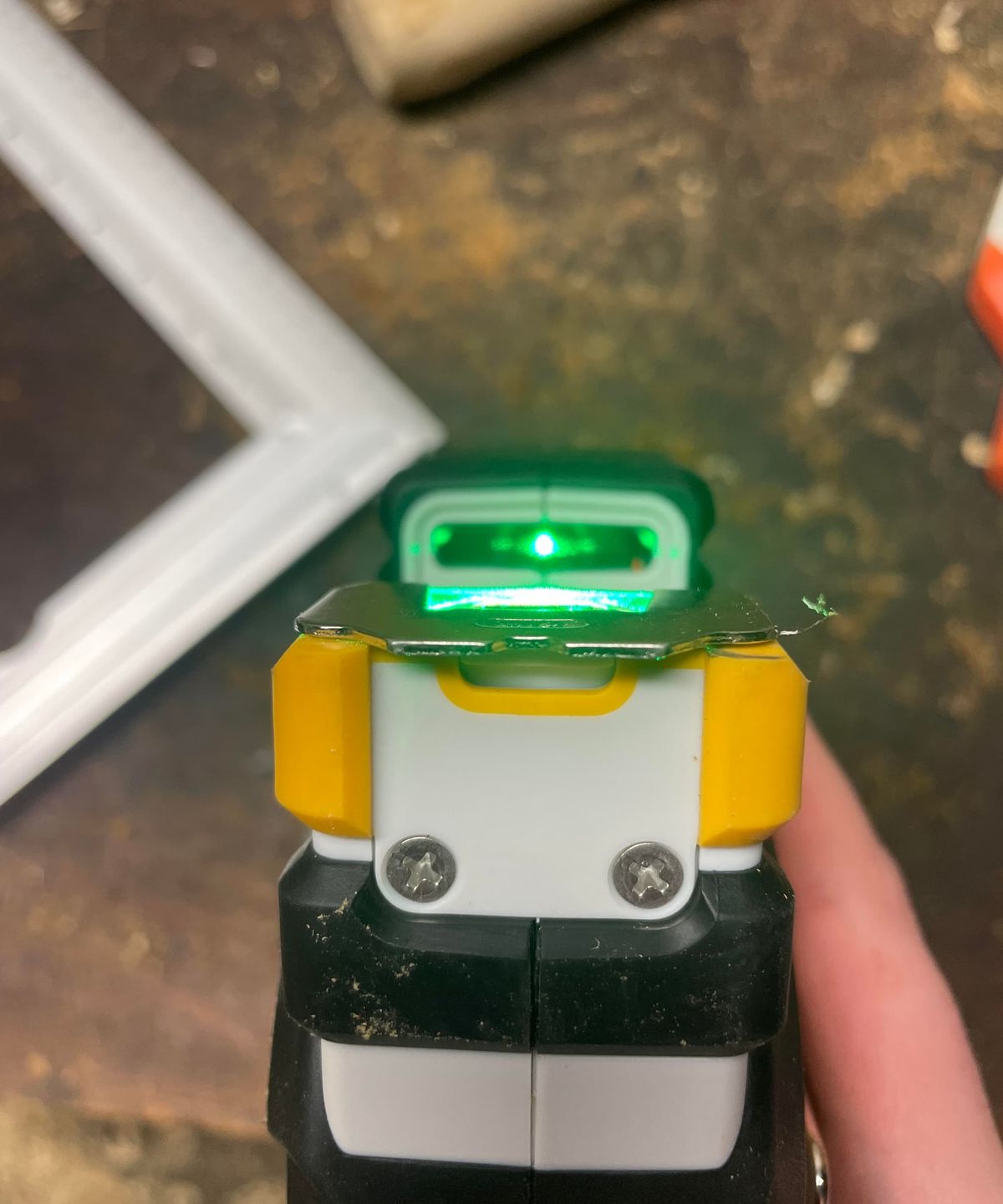 A view underneath a laser tape measure