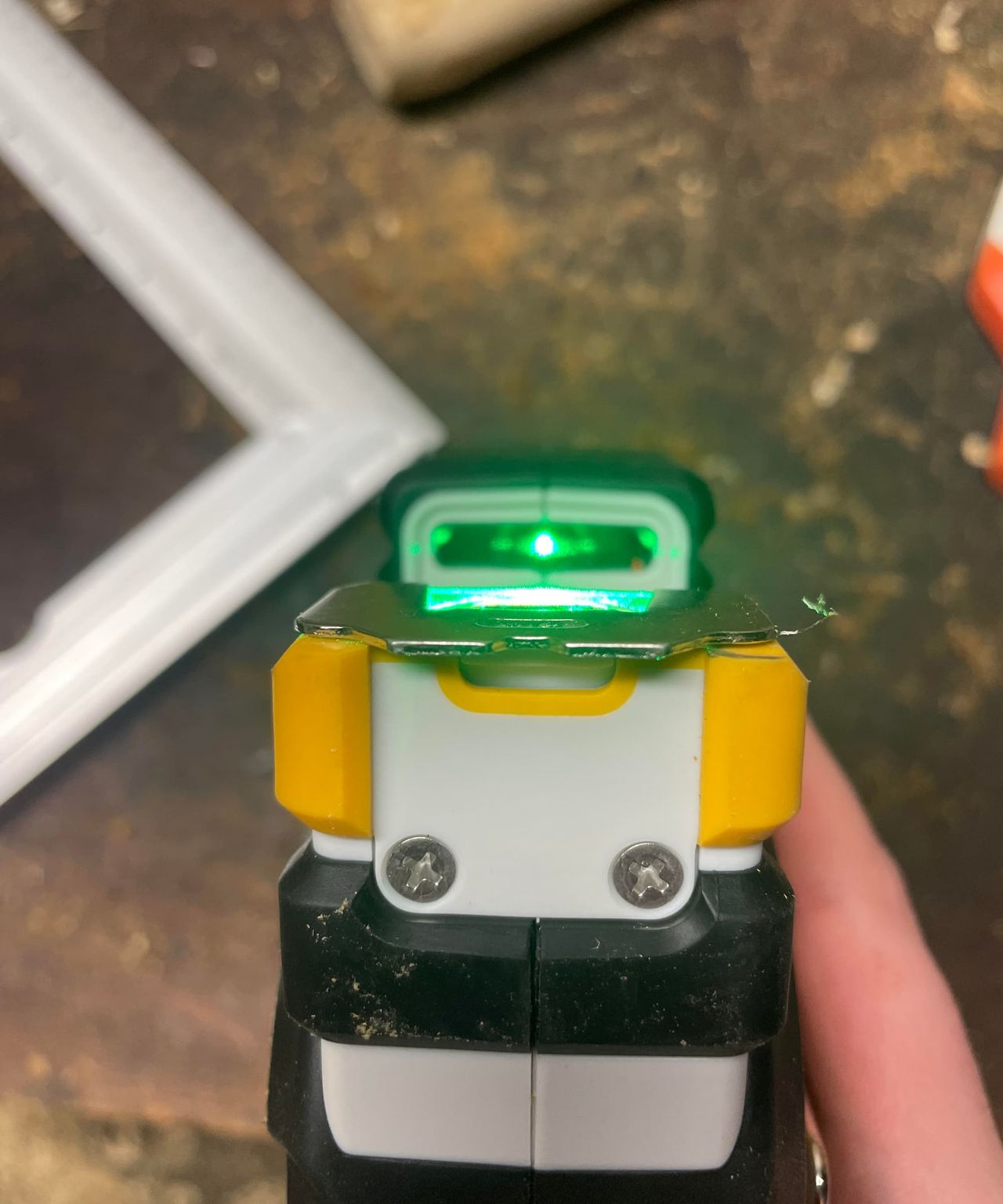 A view underneath a laser tape measure
