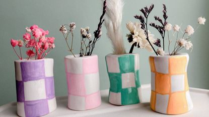 Cute petite checkered ceramic vases in assorted pastels