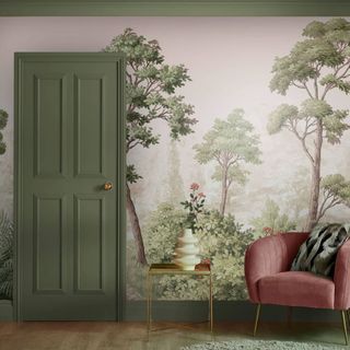 Graham & Brown Grizedale Green Bespoke Mural in a living room with a pink chair